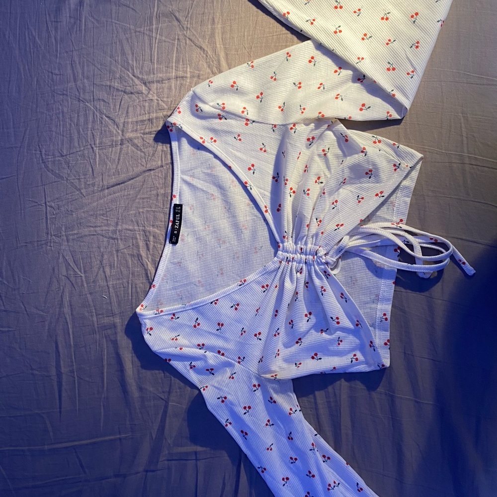 ZAFUL long sleeve crop top with cherry pattern.